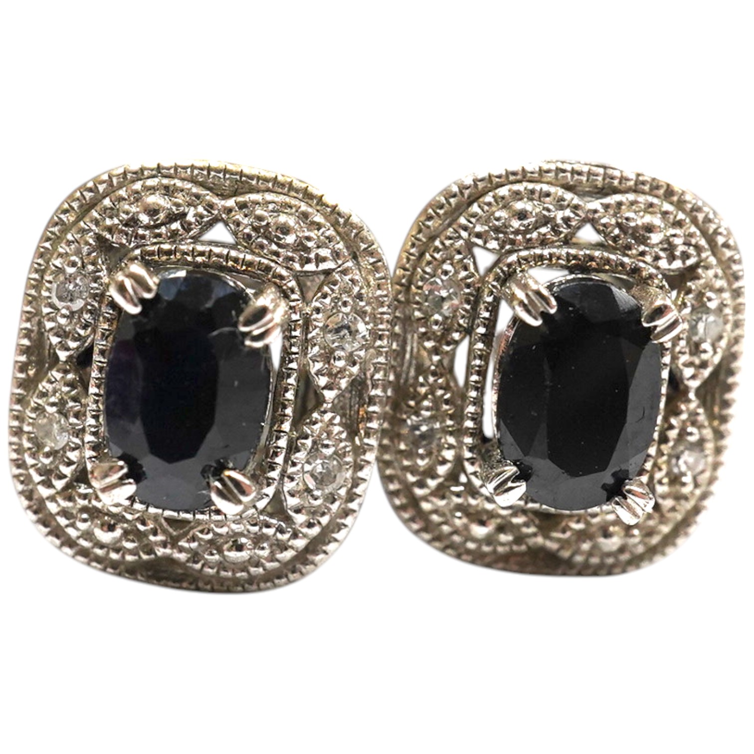 A modern pair of 925, sapphire and diamond set ear studs. Condition - fair to good